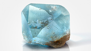 Figure 1. A fine 925 ct crystal that was formerly displayed in the Texas State Capitol and sat on the governor’s desk in 1969 when the legislature adopted blue Texas topaz as the state gem. This specimen was found in 1904 and now resides in the Hamman Gem and Mineral Gallery in the Department of Earth and Planetary Sciences at the University of Texas at Austin (catalog no. B0344). Photo by Blanca Espinoza.